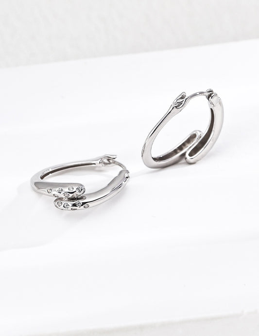 Gentle Resolve · Twisted Zirconia Gold Earrings