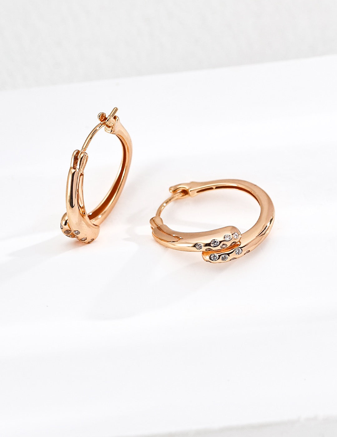 Gentle Resolve · Twisted Zirconia Gold Earrings