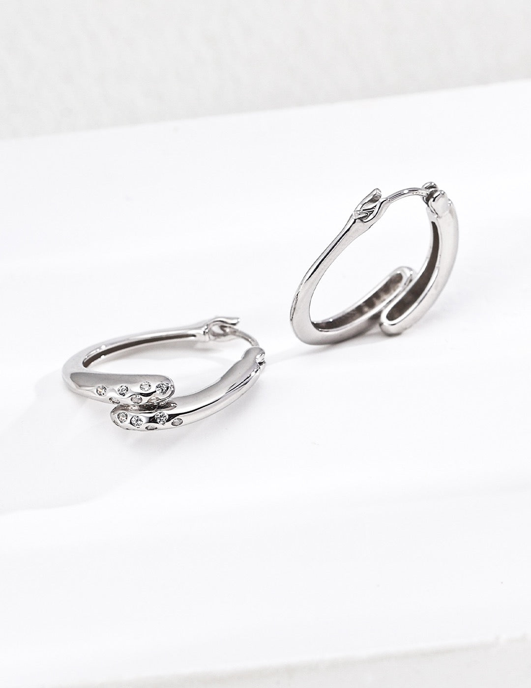 Gentle Resolve · Twisted Zirconia Gold Earrings