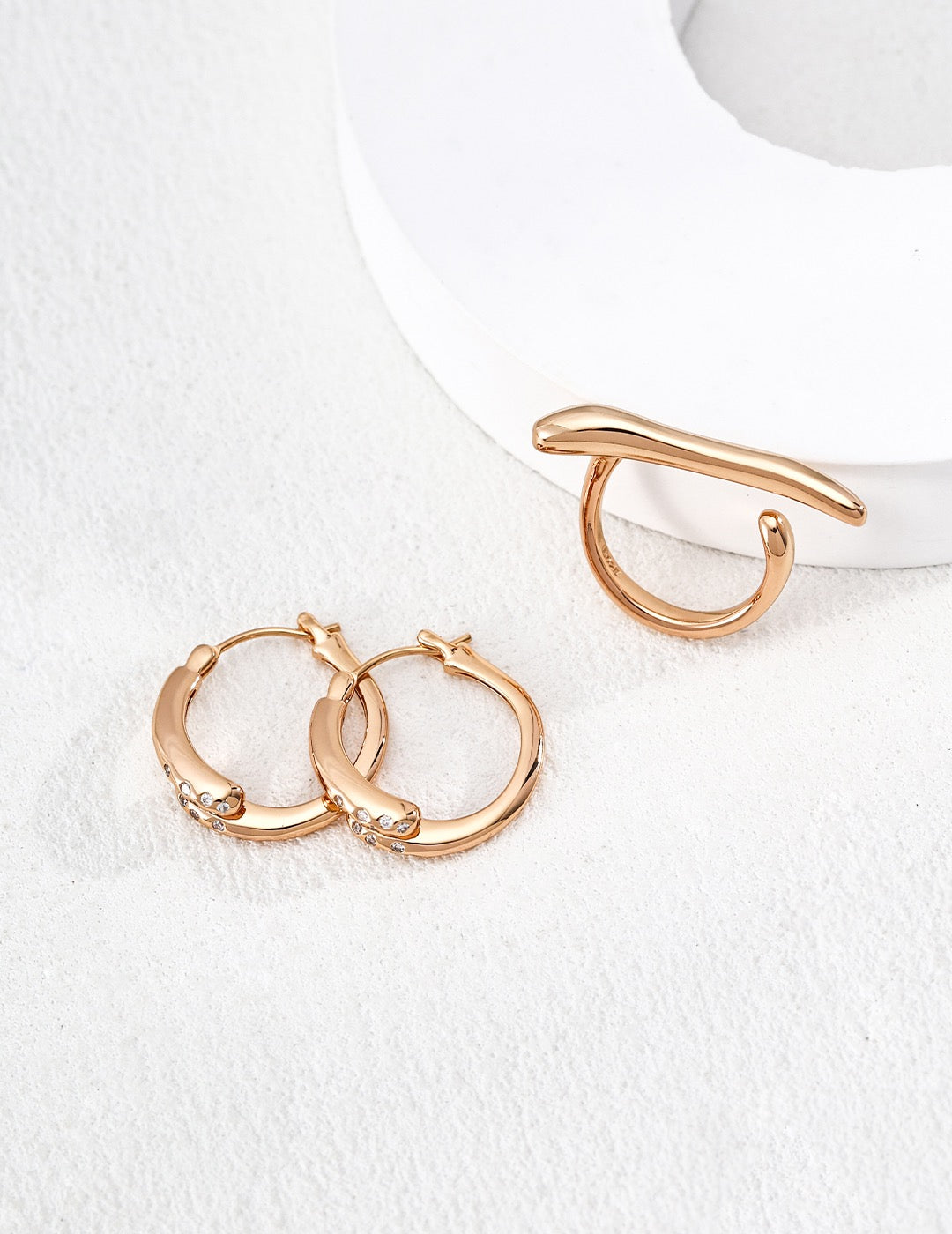 Gentle Resolve · Twisted Zirconia Gold Earrings