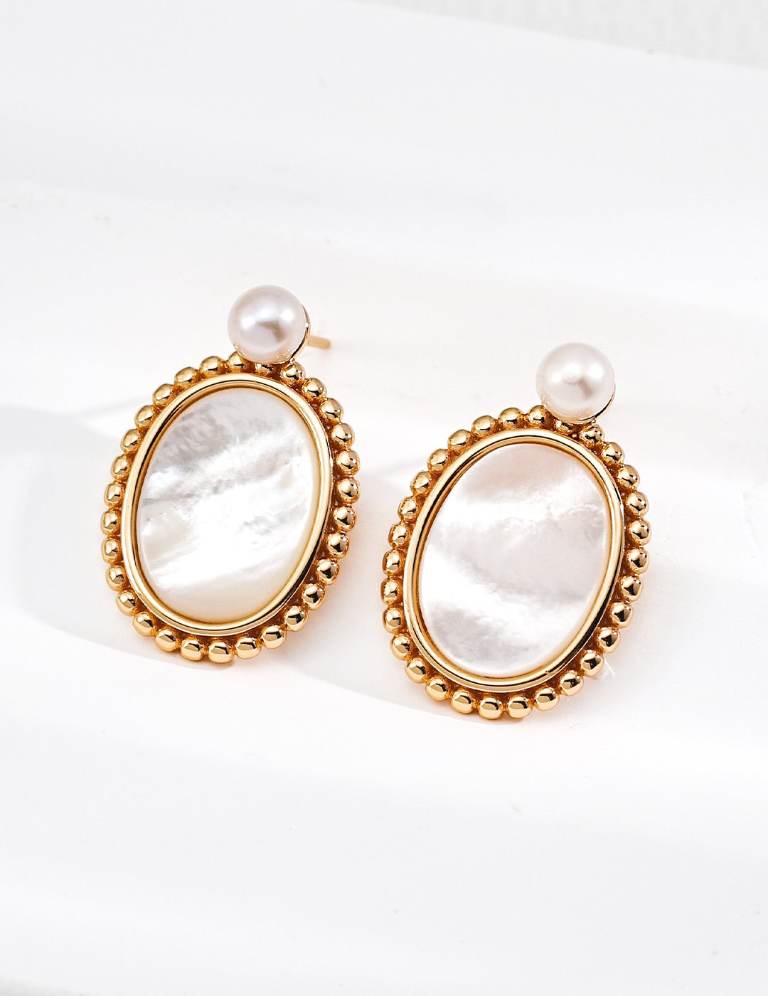 Across Centuries · Natural Pearl & Mother of Pearl Earrings