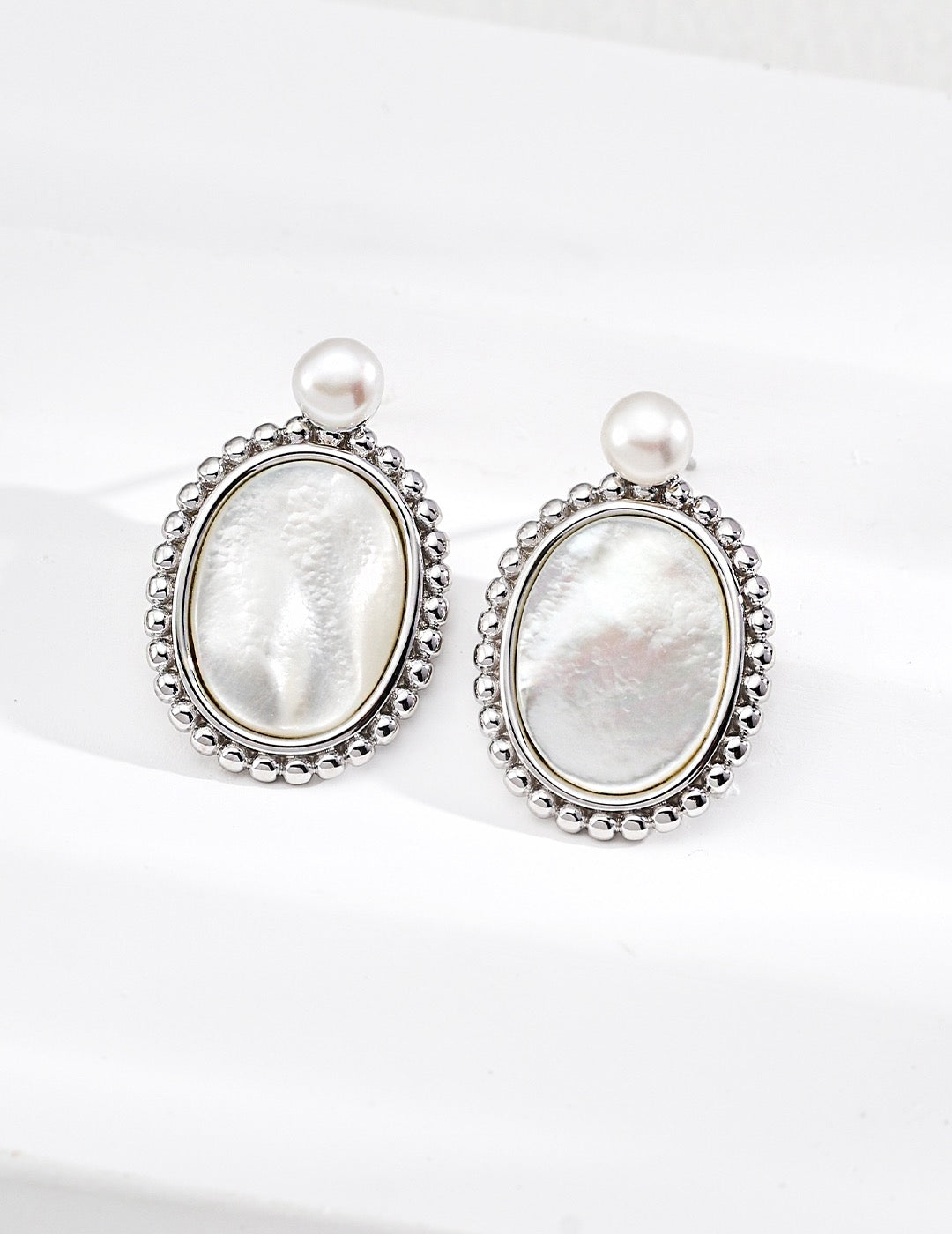 Across Centuries · Natural Pearl & Mother of Pearl Earrings