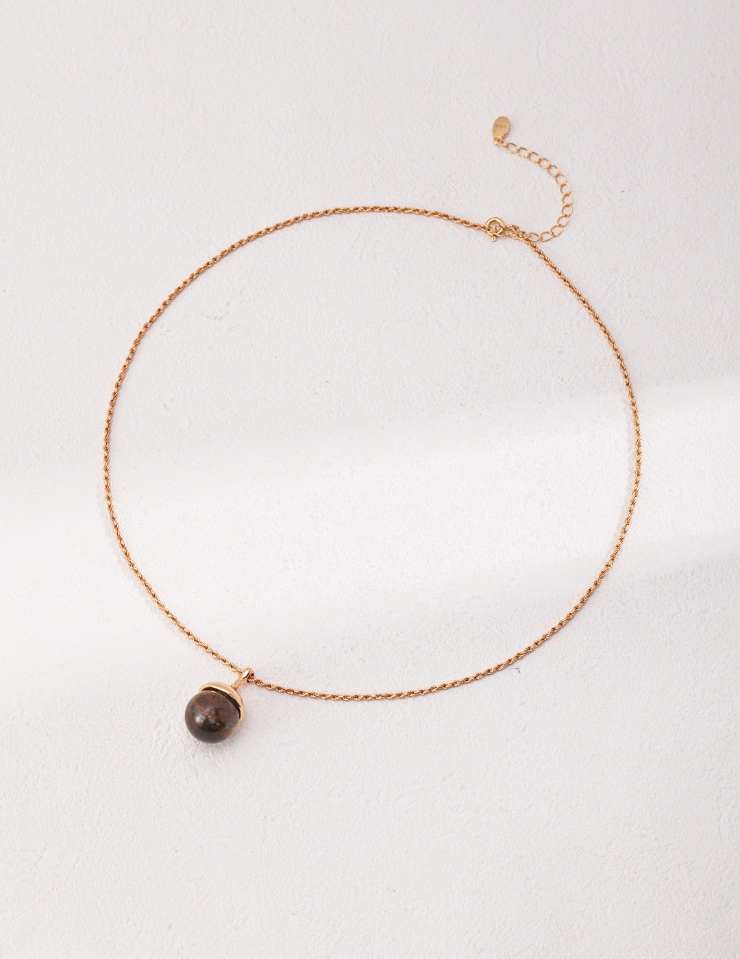 The Garden · Tiger's Eye Pine Cone Pendant Necklace